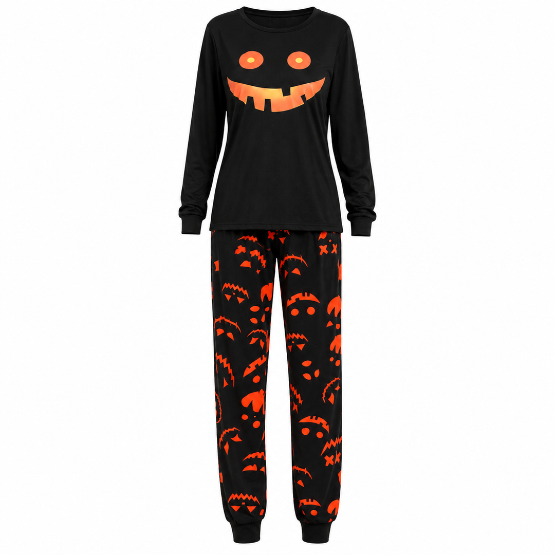 Black long-sleeve pajama set featuring jack-o-lantern smile top and orange pumpkin-face jogger pants