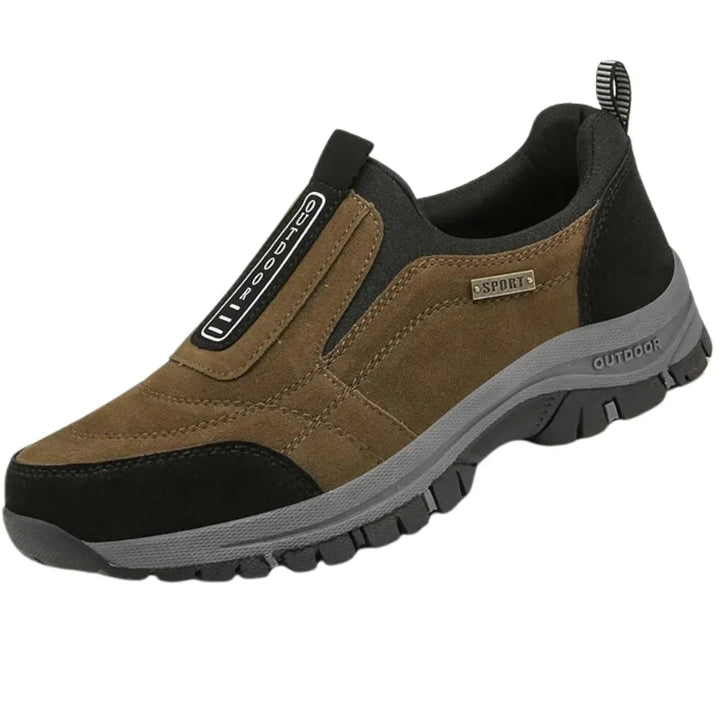 Brown suede slip-on trail sneaker with black heel pull tab