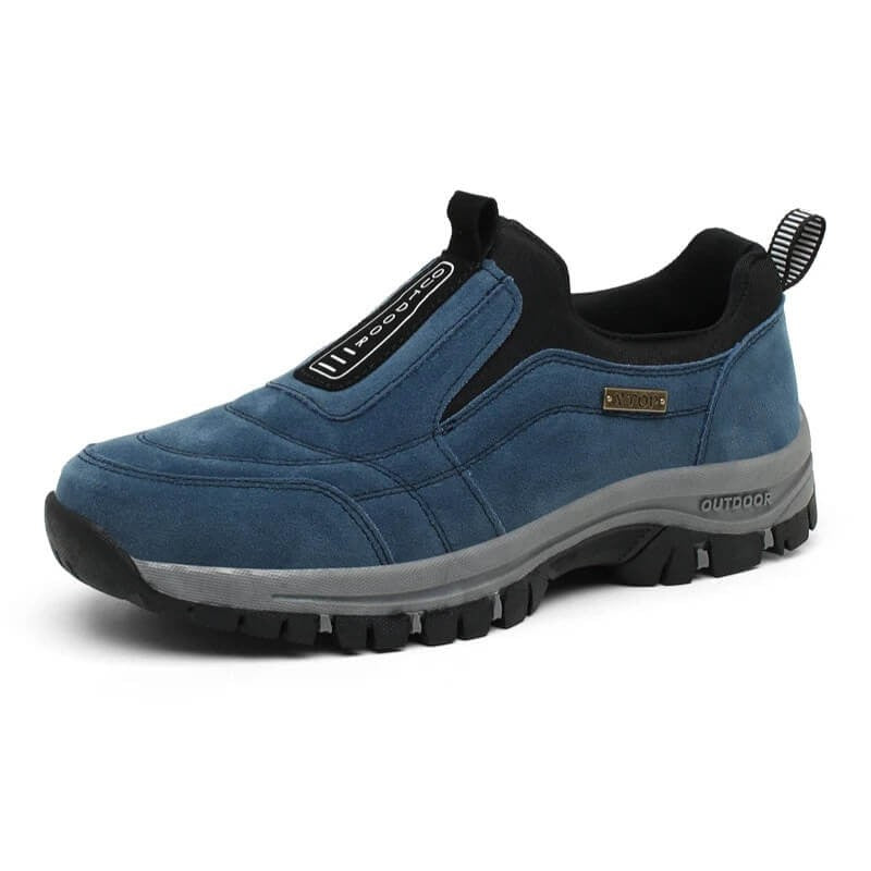 Navy blue suede slip-on walking shoe with gray textured outsole