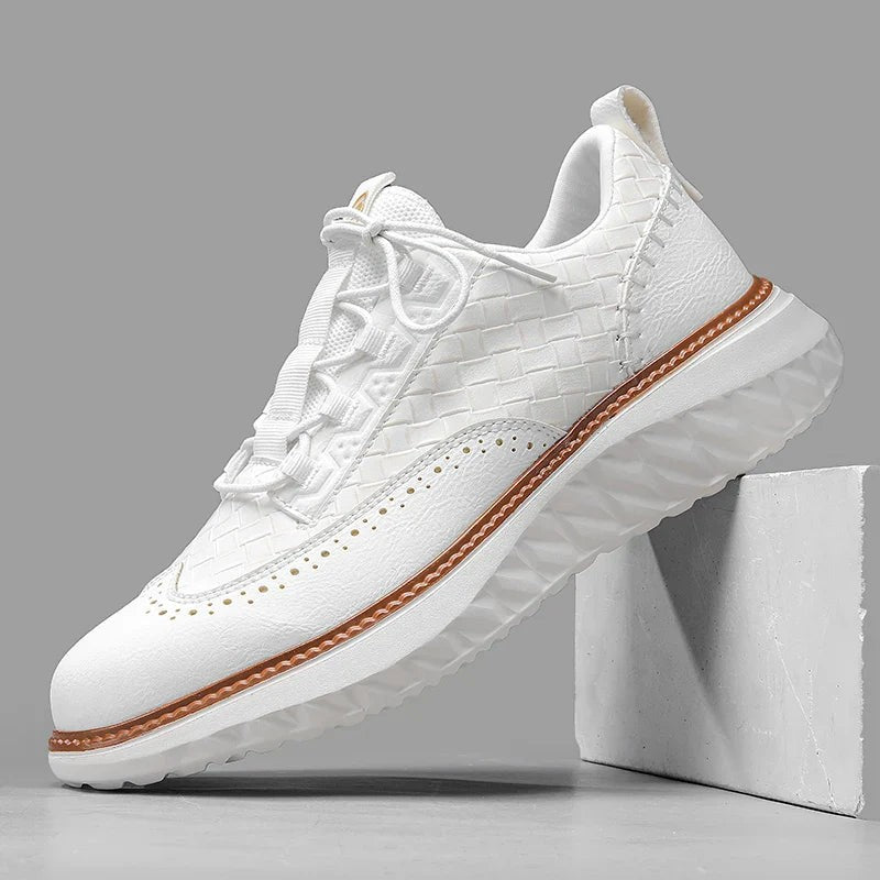 White leather woven sneaker with brogue perforations and tan trim sole