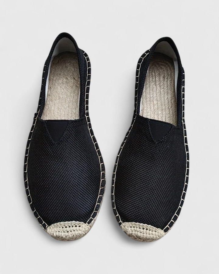 black woven espadrilles with jute toe accent, top view