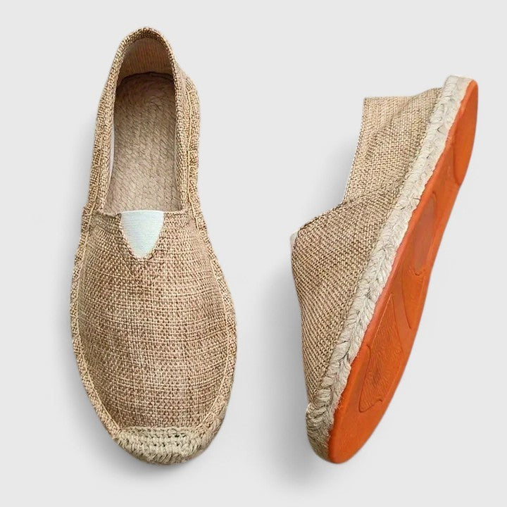 natural woven espadrilles with orange rubber sole, side view