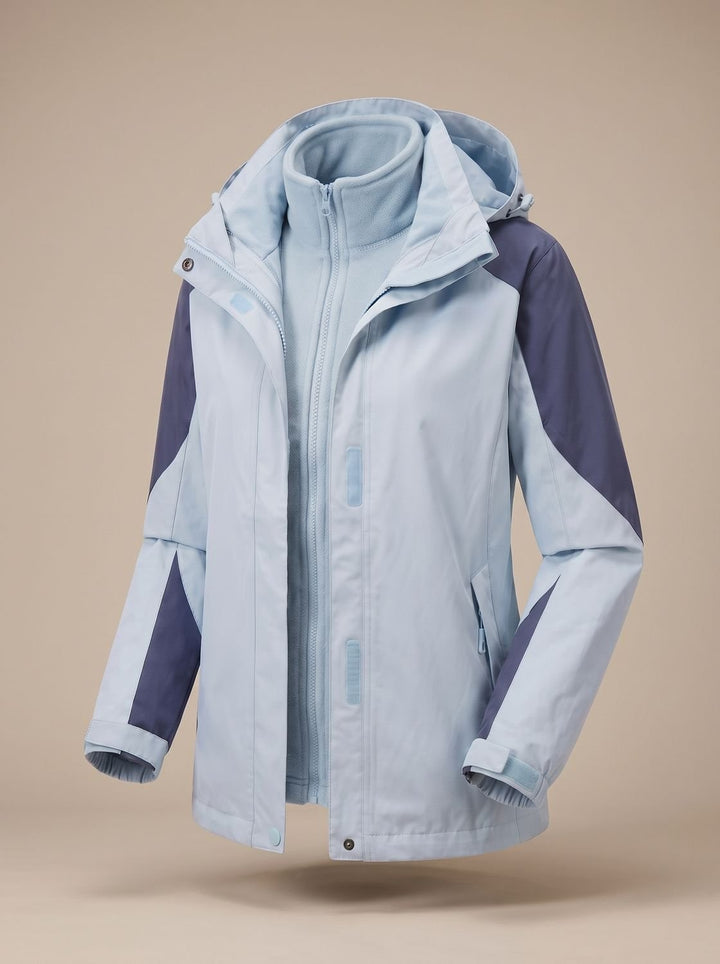 Light blue and navy colour-block hooded softshell jacket shown open, fleece visible