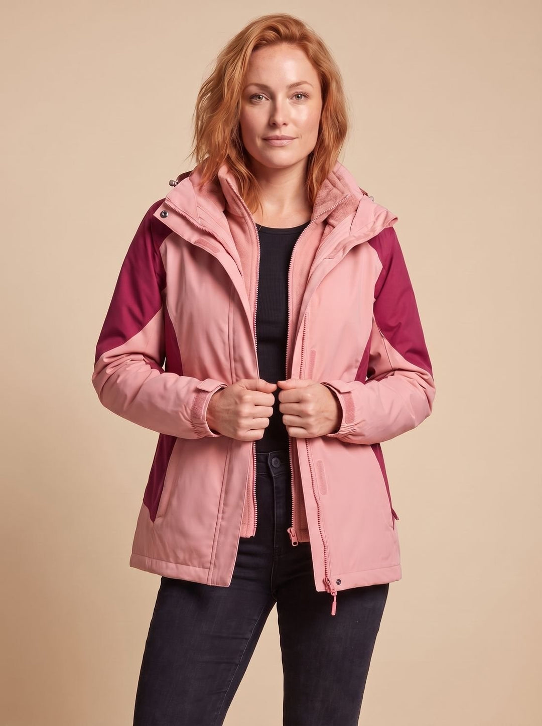 Front view of blush pink 3-in-1 hooded jacket with contrasting maroon panelled sleeves