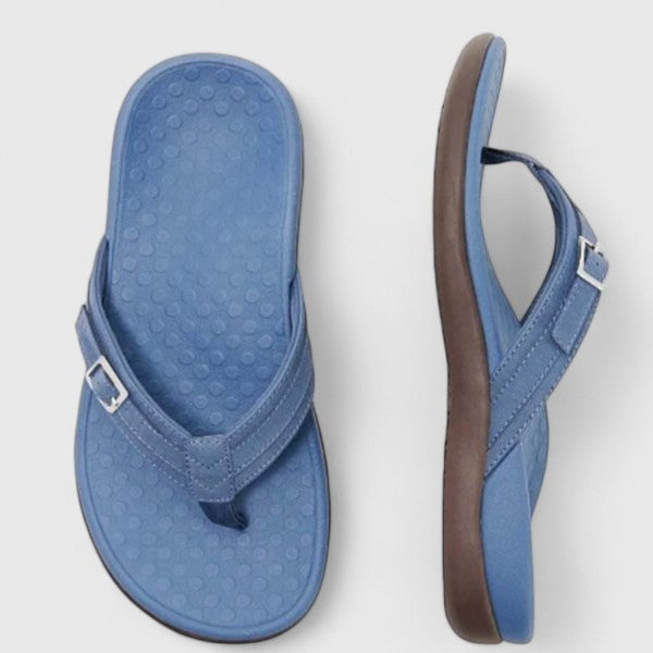 Blue leather flip-flop sandals with buckle strap and contoured footbed