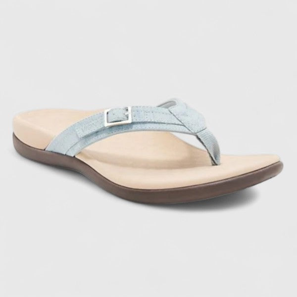 Light blue suede thong sandal with adjustable buckle and tan footbed