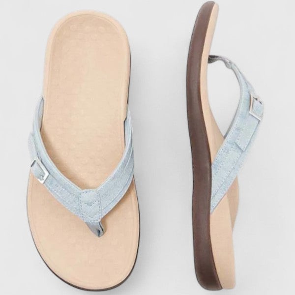Light blue denim thong sandals with buckle strap and arch support footbed