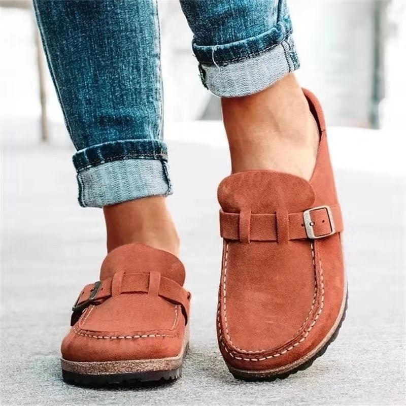 Rust suede clog sandals with buckle strap and stitched cork sole