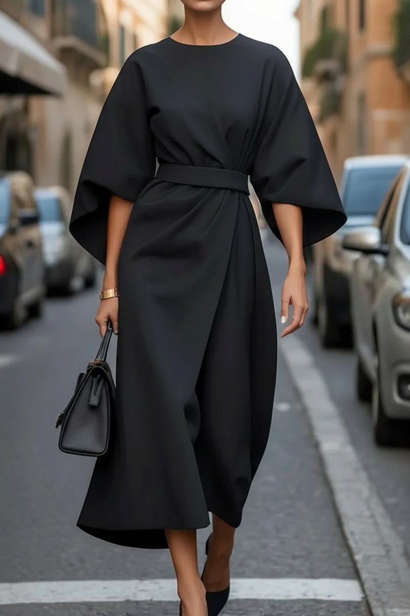 Black cocktail midi dress with dramatic sleeves and waist tie