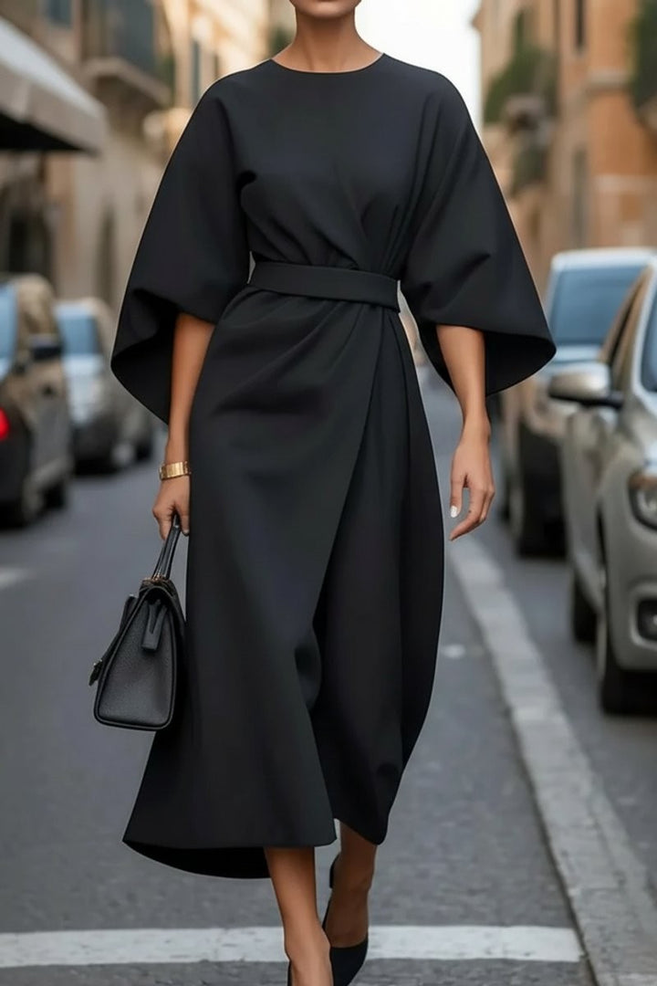 Black cocktail midi dress with dramatic sleeves and waist tie