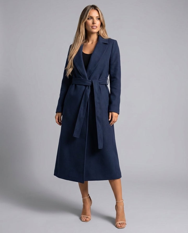 Navy belted trench coat with notch lapel styled with nude heels