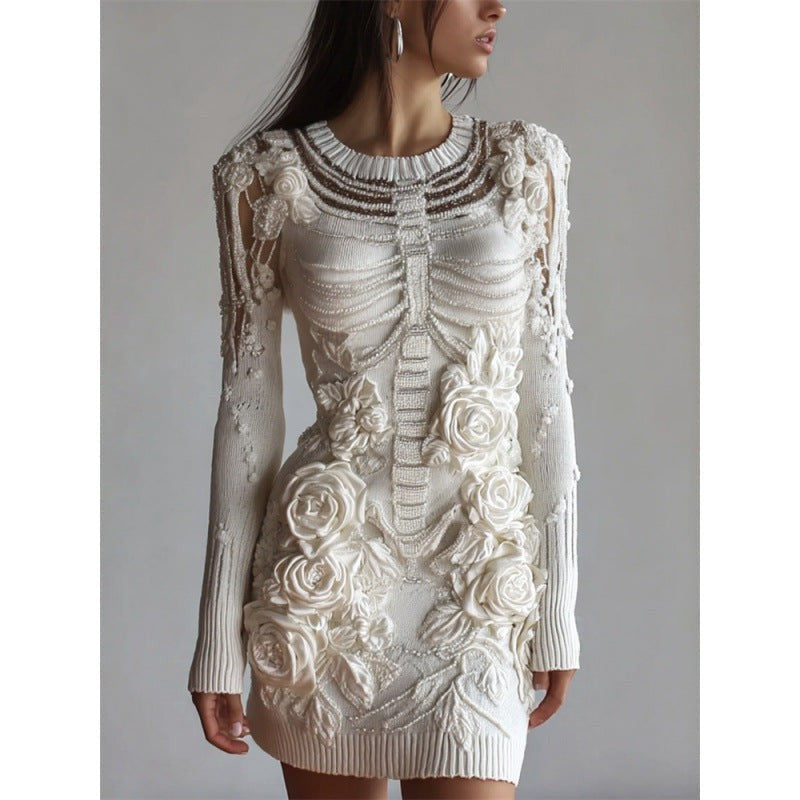 ivory knit mini dress with 3D rose appliqués and skeleton spine detail