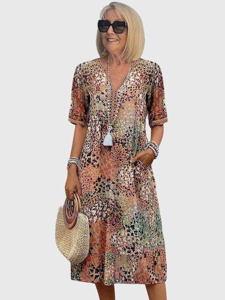 Boho V-neck midi dress in earthy floral print with pockets