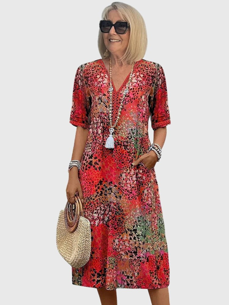 Red floral print midi dress with V-neck and half sleeves