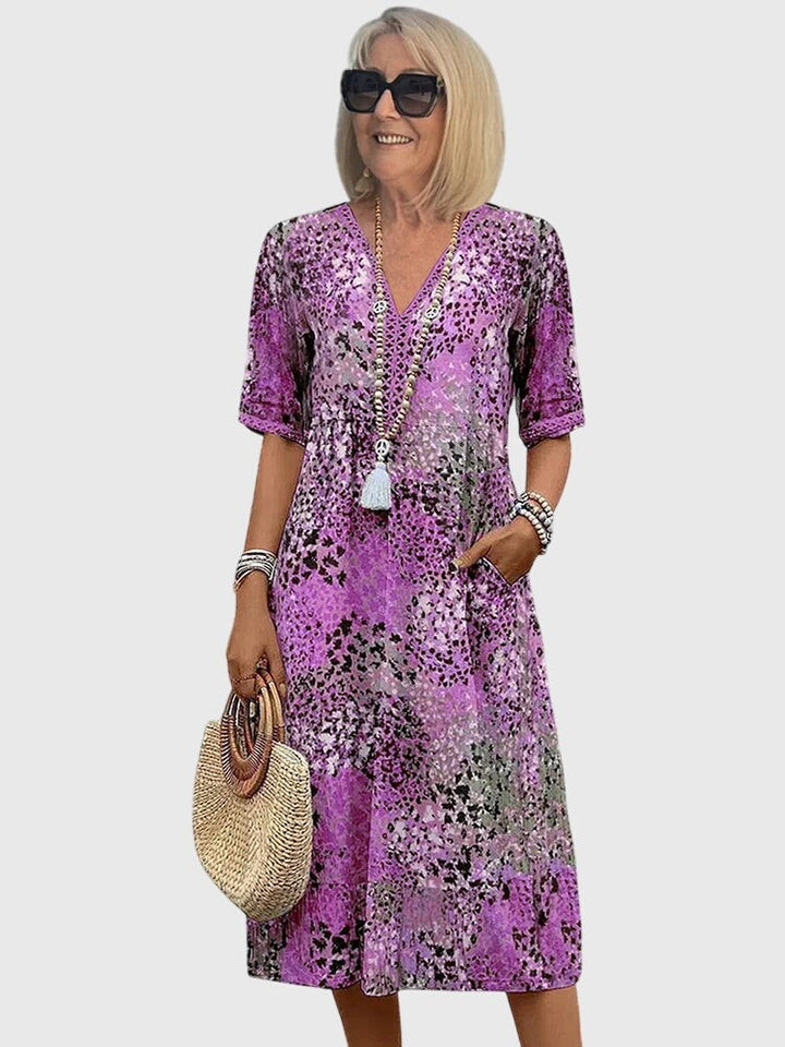 Purple floral midi dress with V-neck and short sleeves