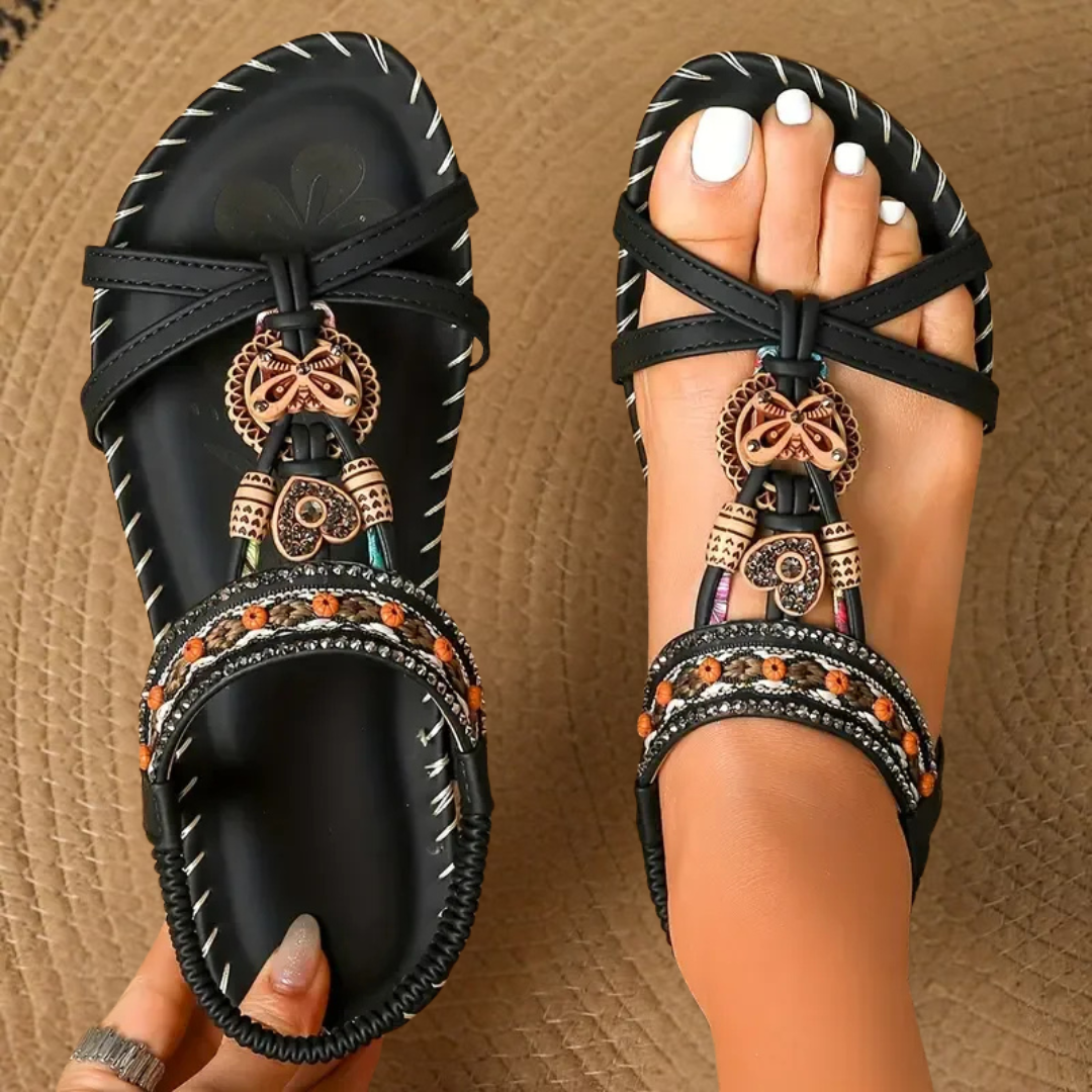 Black boho sandals with tribal beaded band and butterfly charm