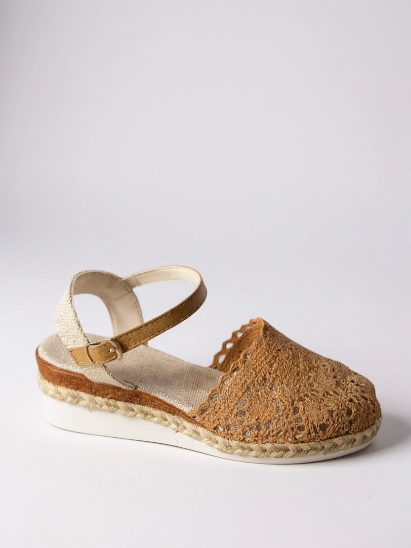 Side view of camel woven espadrille wedge with buckled ankle strap