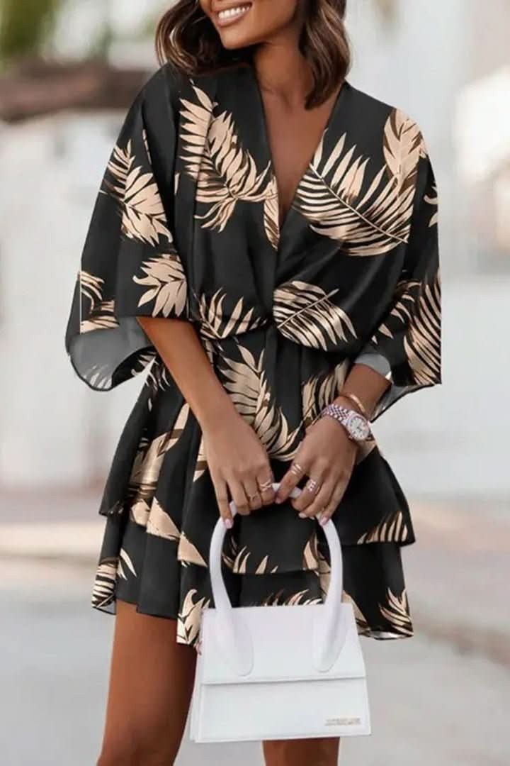 black and gold palm-print cocktail dress with flutter sleeves