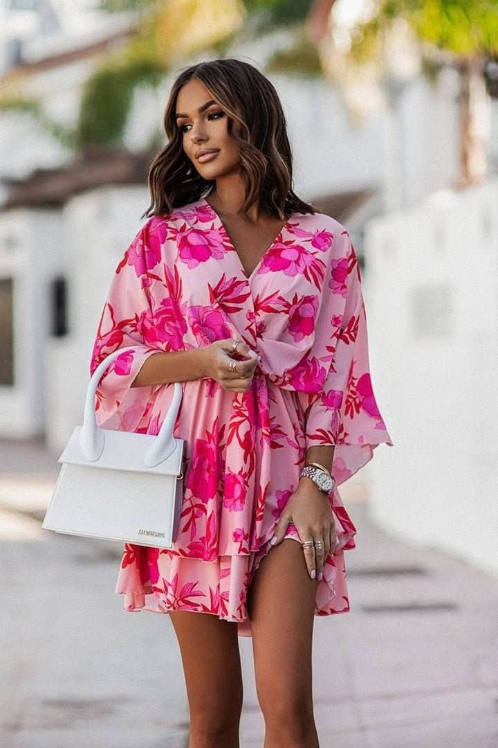 pink and red floral cocktail dress with tiered ruffle skirt