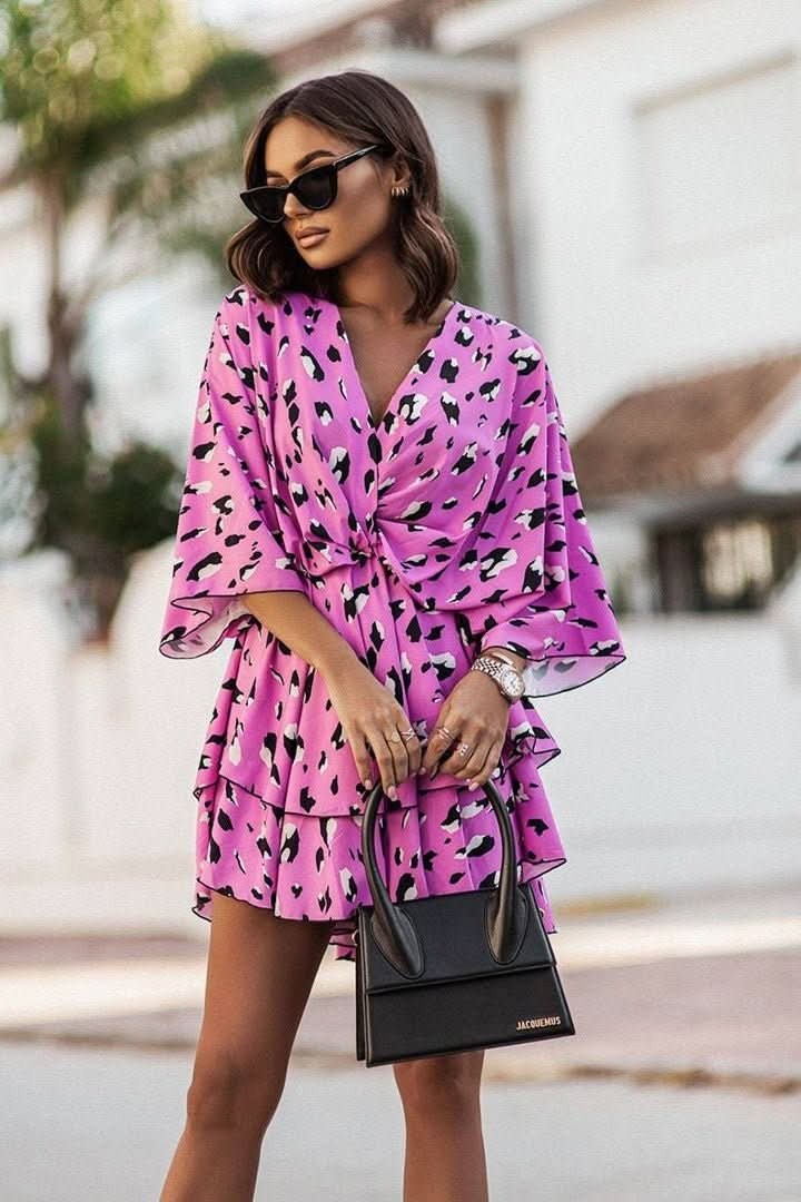 purple leopard-print mini dress with wrap neckline and flutter sleeves