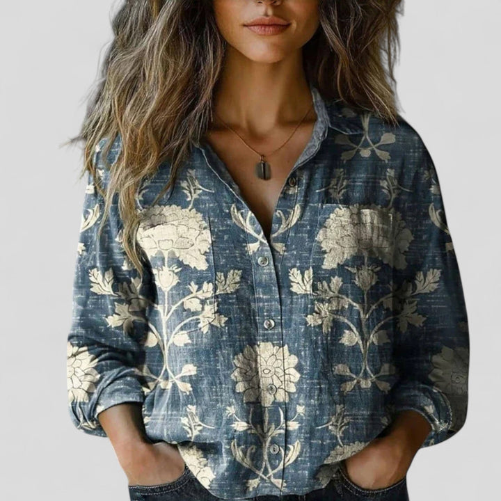 Navy blue floral print button-down blouse with vintage-style long sleeves