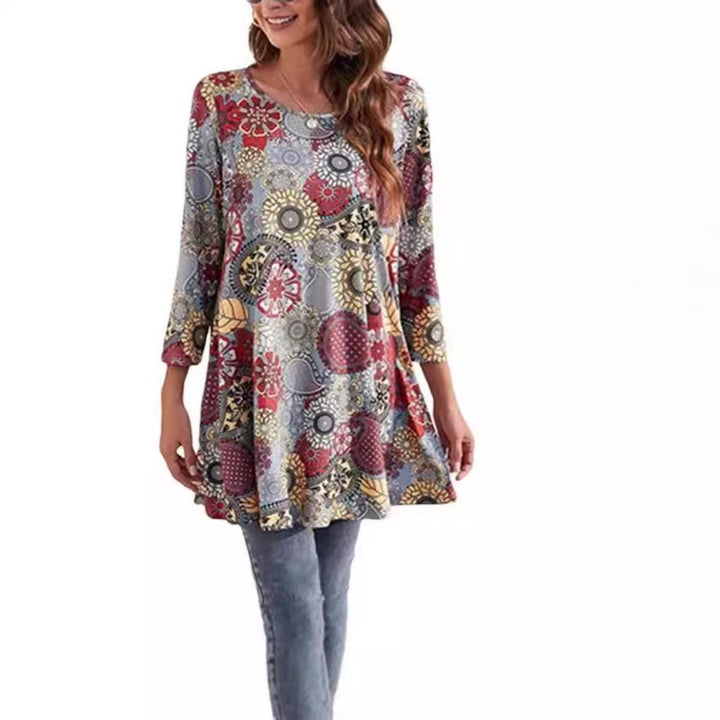 Gray multicolor medallion-print tunic top styled with distressed jeans