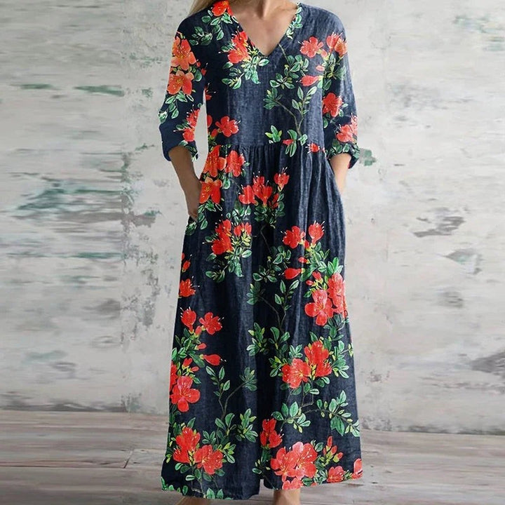 navy floral print maxi dress with V-neck and three-quarter sleeves