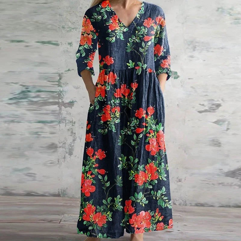 Navy maxi dress with red floral print and three-quarter sleeves