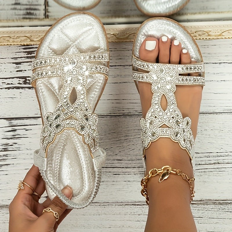 Silver metallic rhinestone sandals with crystal floral straps and open toe design