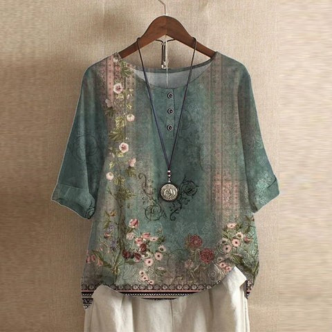Sage green floral patchwork print blouse with half sleeves and button placket