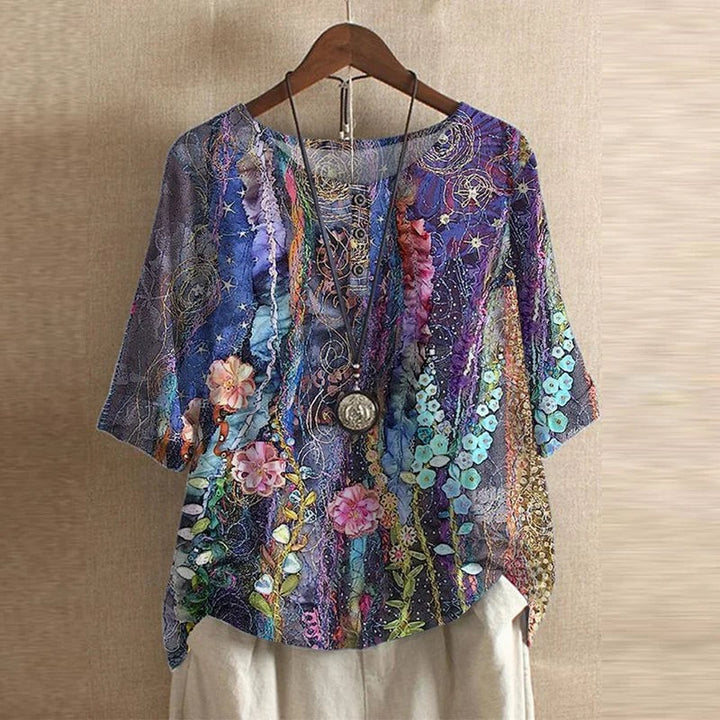 Multicolor floral embroidered mesh blouse with sequin detail and half sleeves