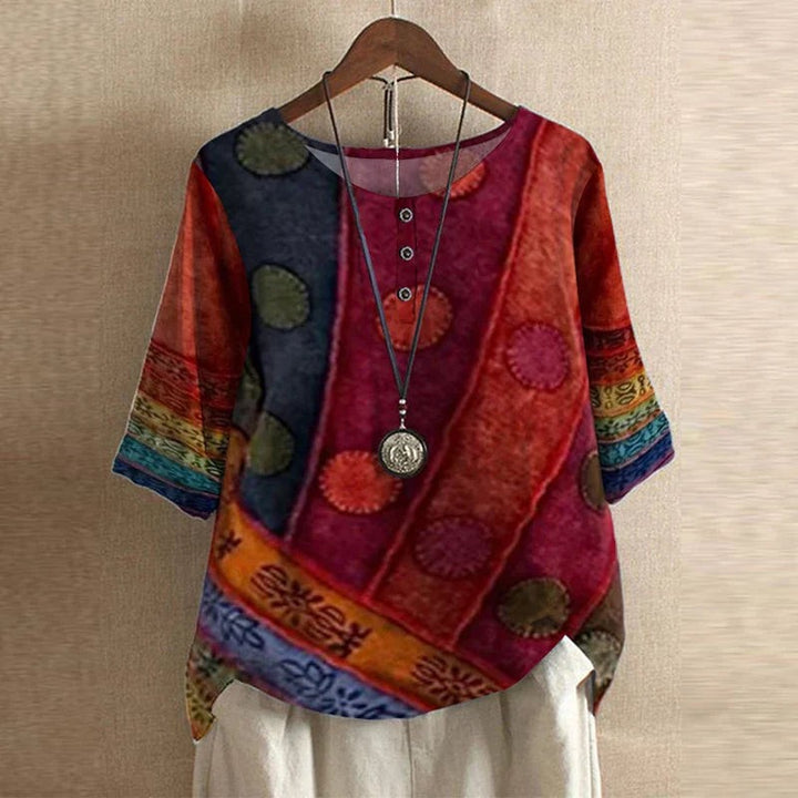 Red and burgundy patchwork print blouse with round medallion pattern, half sleeves