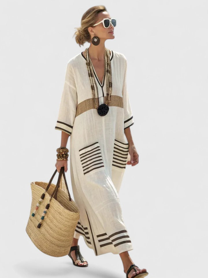 Ivory linen kaftan dress with brown stripes and striped pocket accents