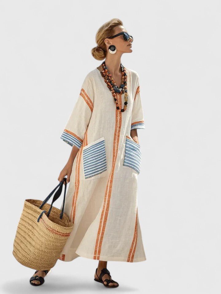 Ivory linen kaftan with orange stripes and contrasting blue striped pockets