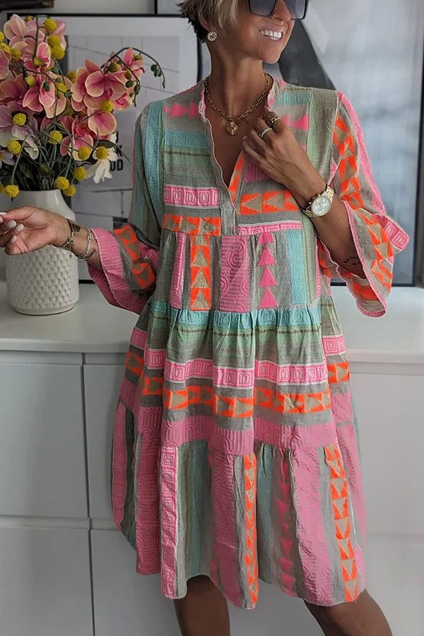 Bohemian geometric print midi dress with tiered ruffle hem and long sleeves