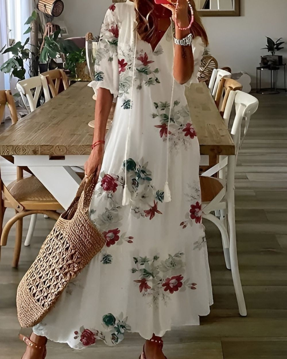 white floral print maxi dress with tasseled V-neck detail