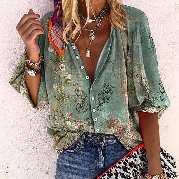 sage green floral print blouse with button-down front and V-neck