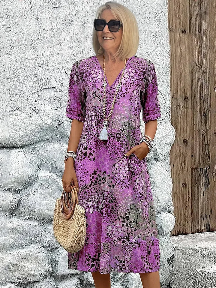 Purple floral print midi dress with V-neck and relaxed A-line fit