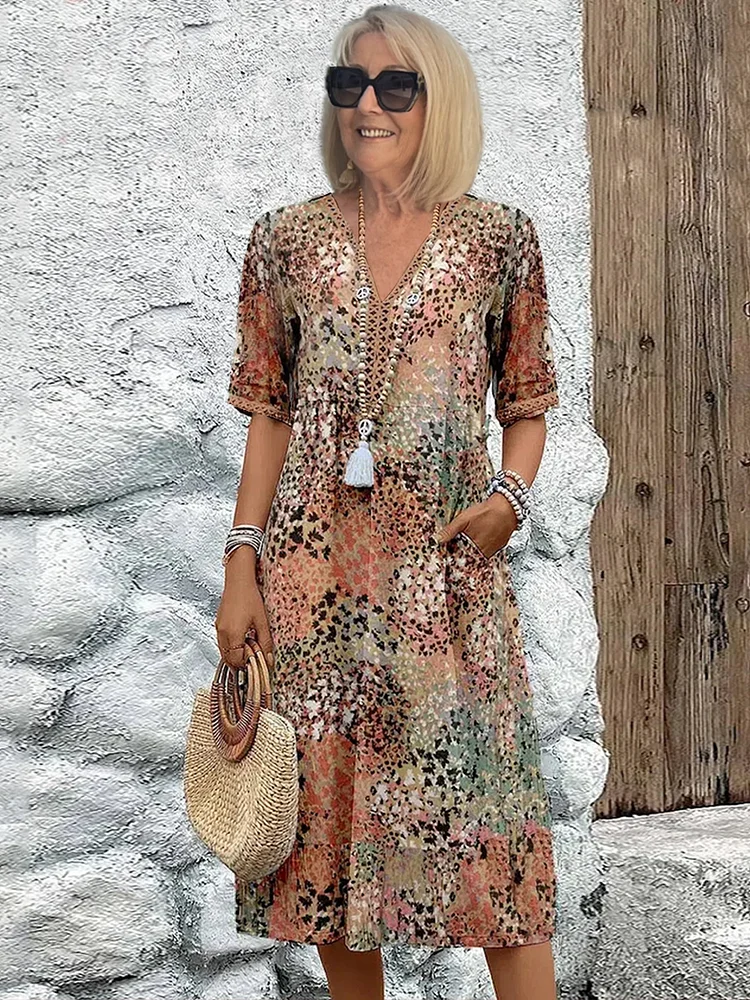 Earth-tone floral print midi dress with V-neck and short sleeves, boho look