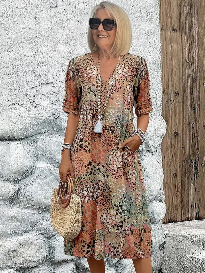 Earth-tone floral print midi dress with V-neck and short sleeves, boho look