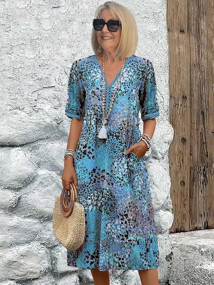 Blue floral print midi dress with V-neck and short sleeves, boho style
