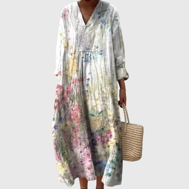 White floral print maxi dress with long sleeves and V-neck