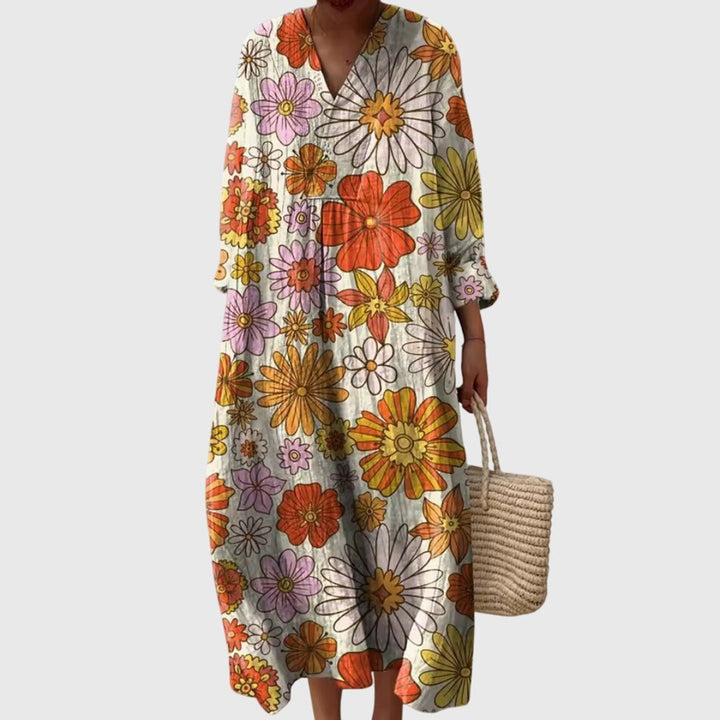 Retro daisy print maxi dress with V-neck and long sleeves