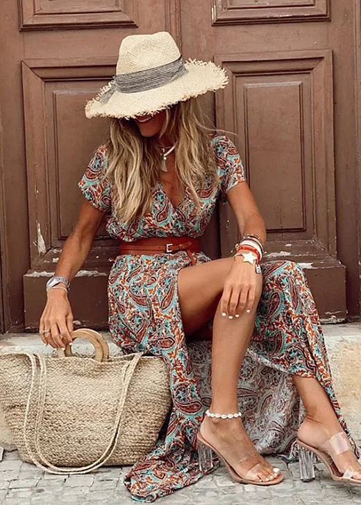 rust and teal paisley maxi dress paired with straw fedora hat