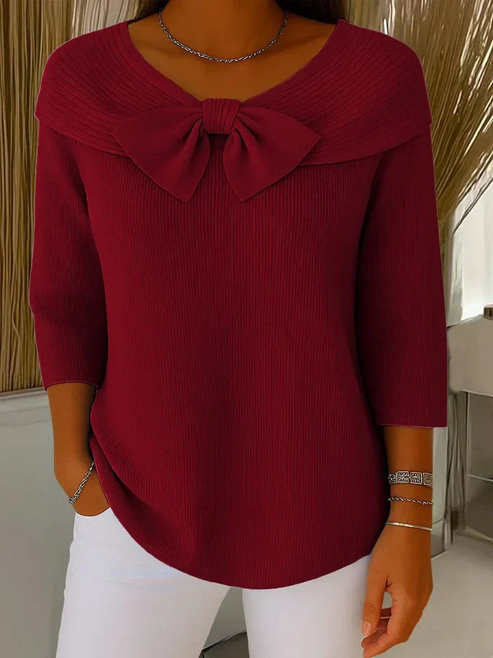 Burgundy ribbed sweater with off-shoulder bow neckline design