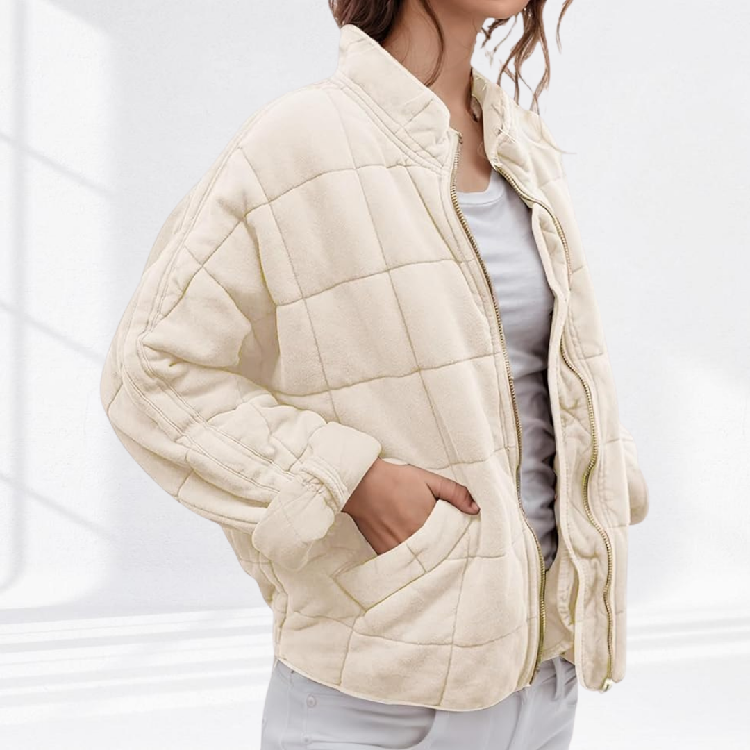 Cream quilted puffer jacket with stand collar and exposed gold zip