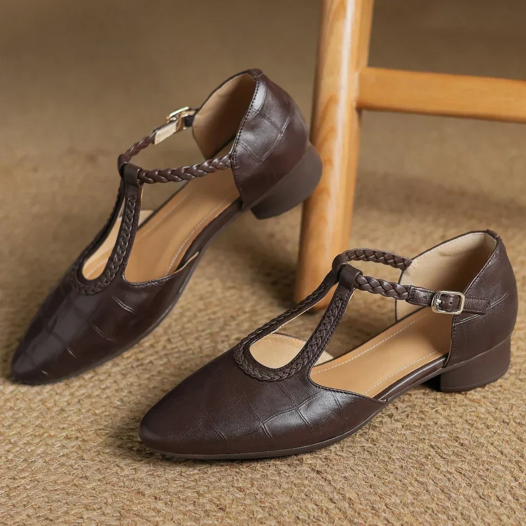 pointed toe brown leather Mary Jane flat with braided strap detail worn on foot