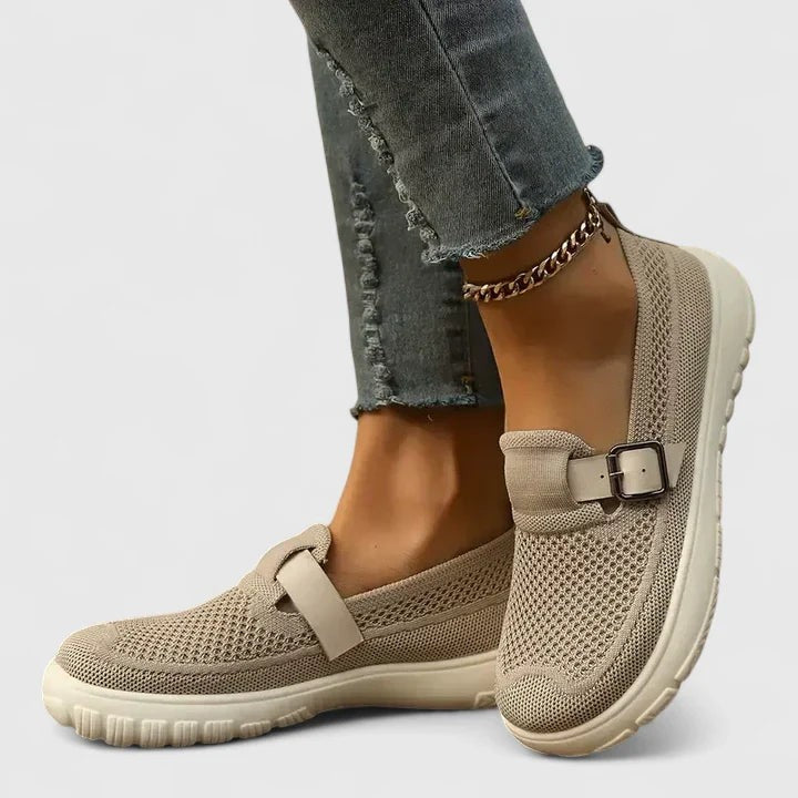 beige knit slip-on loafers featuring adjustable buckle detail and cushioned sole
