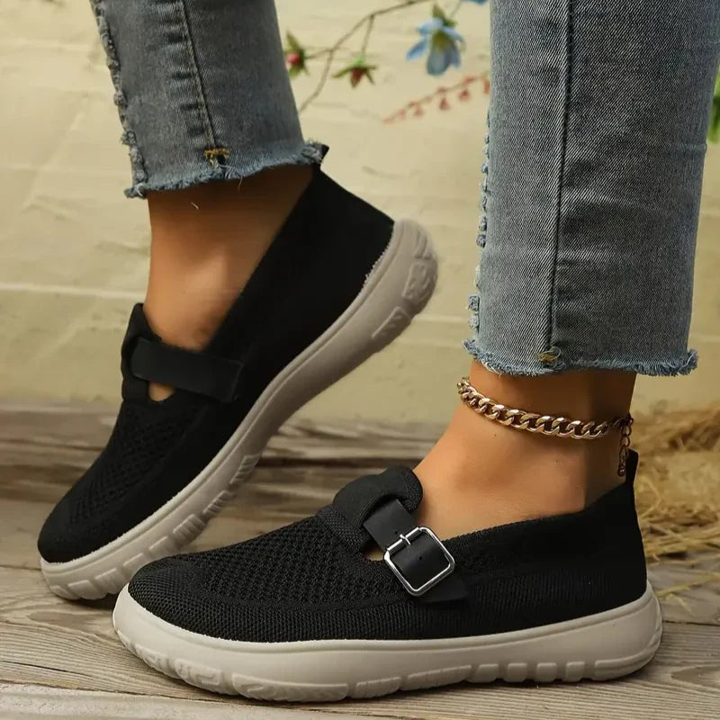 Black knit Mary Jane sneakers with buckle strap and contrasting platform outsole