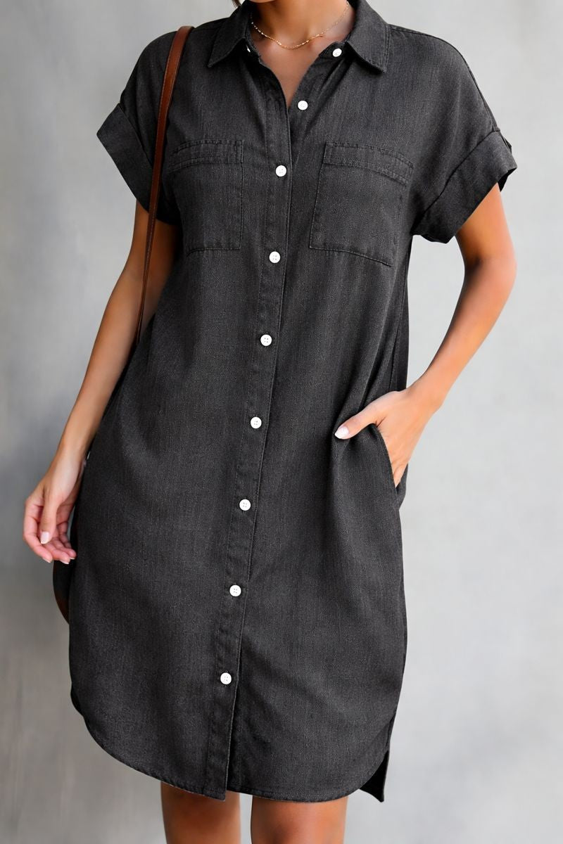 Black chambray shirt dress featuring collared neckline and side pockets